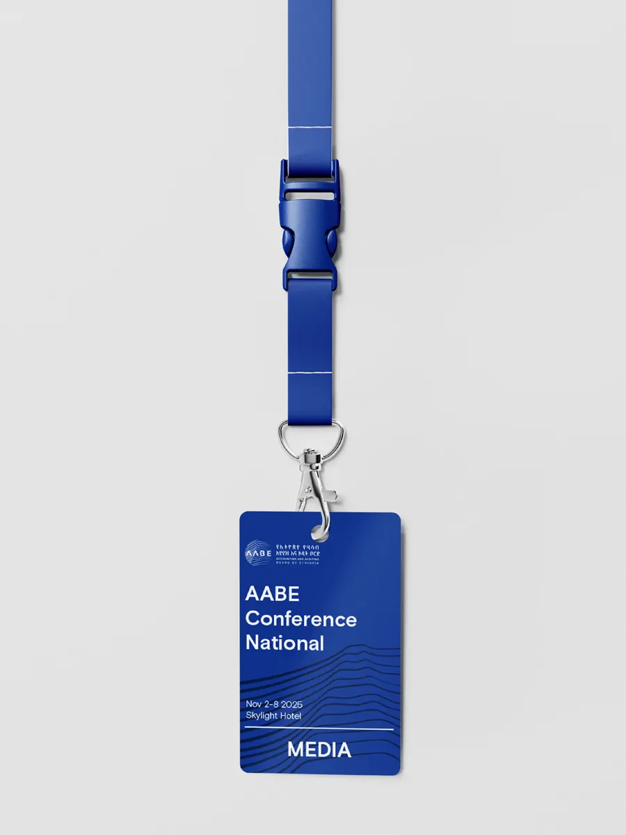 Blue AABE event badge marked Media, on a blue lanyard.