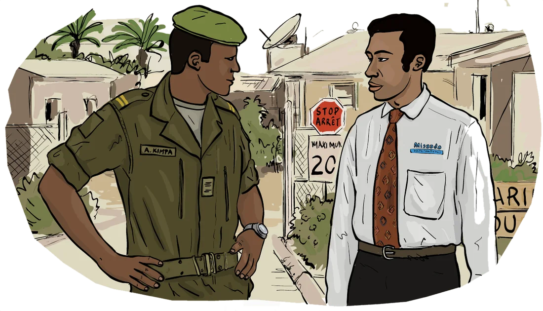 An officer in uniform and a civilian in a suit and tie meet at the entrance of a military camp.