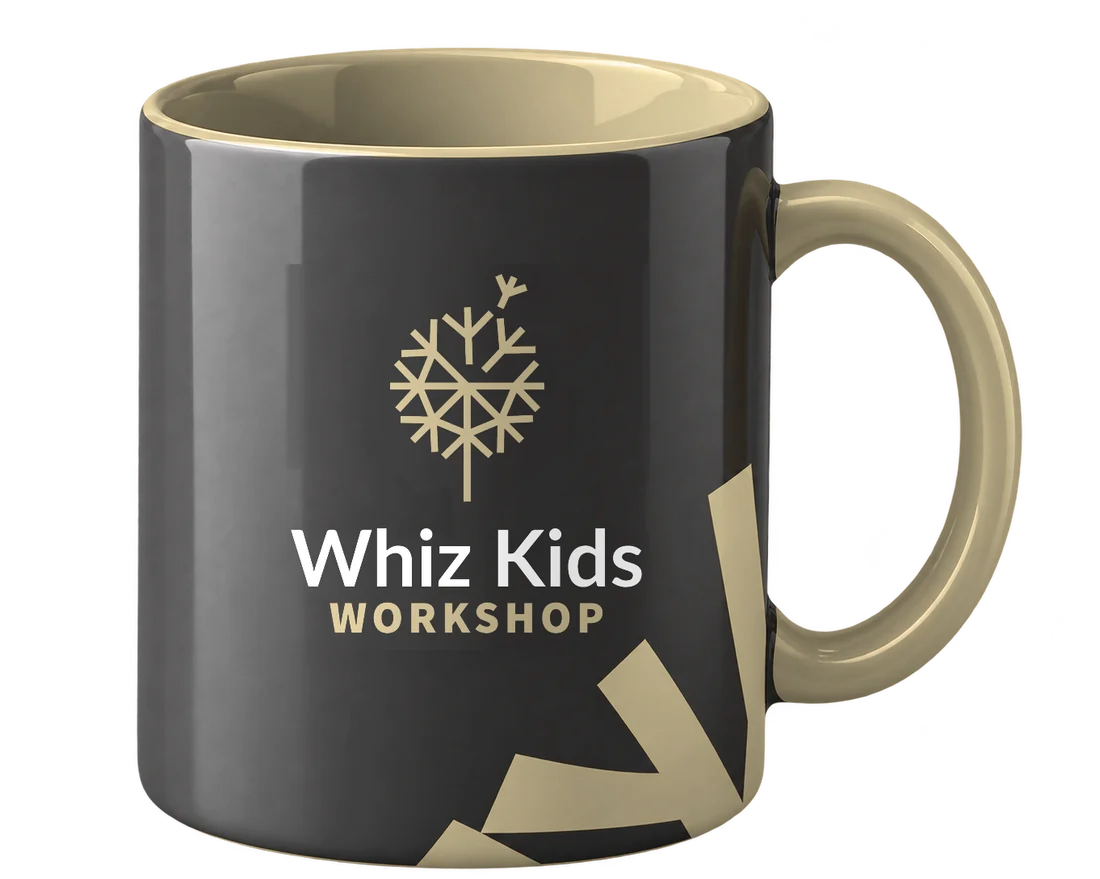 A glossy charcoal mug with a gold interior and handle, printed with the Whiz Kids Workshop logo.