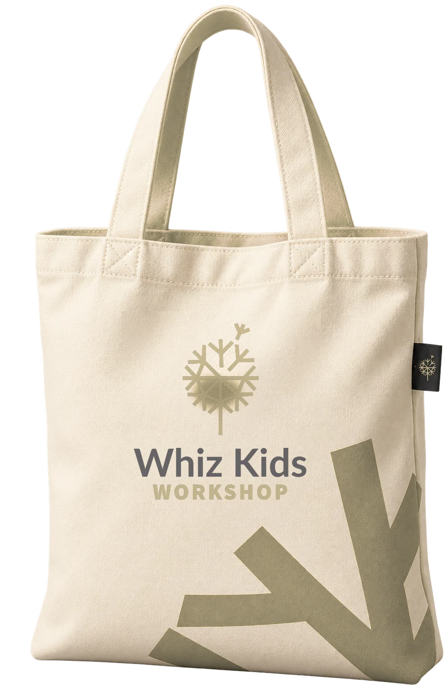A natural canvas tote bag printed with the Whiz Kids Workshop logo and a large gold branch shape; a small black woven label carries the dandelion symbol.